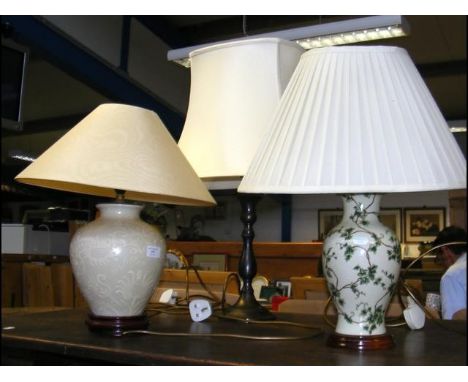 An Oriental style table lamp together with two others