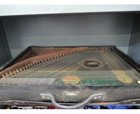 An early 20th Century knee harp/zither , labelled Anglo American 'Lion Zither'