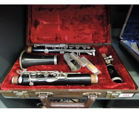 A 'harlequin' clarinet in case, includes Noblet and Corton parts