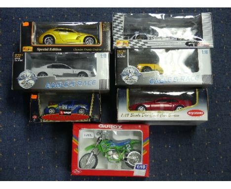 Large scale die-cast models, seven boxed models, including Maisto 1:18 Porsche 911 GT1, Chrysler Pronto Cruizer, Eagle's Race