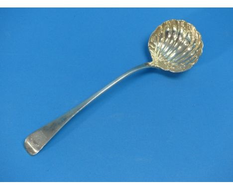 A Victorian silver Ladle, by Samuel Hayne &amp; Dudley Cater, hallmarked London 1842, with shell shaped bowl, the handle cres