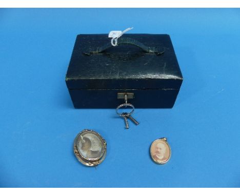 A Victorian oval Mourning Brooch, the front set hair arrangement mounted with seed pearls, the reverse with portrait miniatur