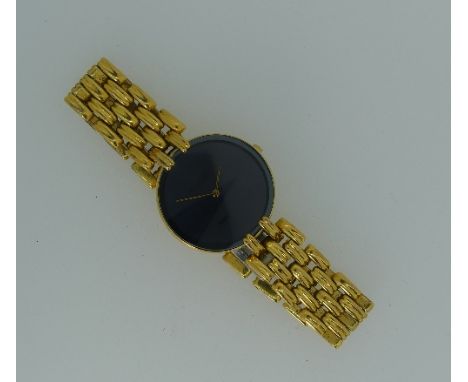 A Christian Dior lady's gold-plated bracelet Wristwatch, Quartz movement, with circular black dial and gate-link bracelet.
