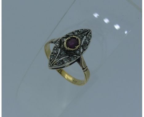 A attractive Dress Ring, of marquise form, the centre set with a pale ruby, the openwork surround with small diamonds, mounte
