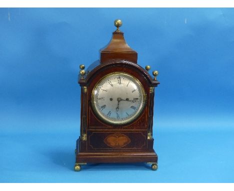 An Edwardian mahogany pagoda-top Bracket Clock, in the Georgian style, with gilt-brass mounts and inlaid decoration, a circul