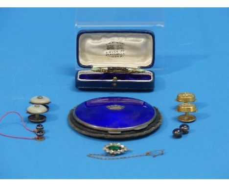 A George VI silver and enamel Powder Compact, by J.W.Barrett, hallmarked Birmingham, 1944, of circular form, the hinged lid w