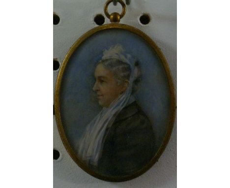 A 19thC portrait miniature of a woman wearing a bonnet, watercolour, oval, in gilt-metal frame, 3¼in (8.25cm) high.