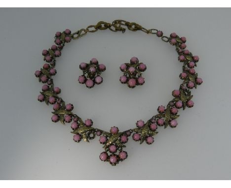 Christian Dior; A 1950's Necklace and Ear Clips Suite, designed by Mitchel Maer, the necklace formed of cross shaped links ea