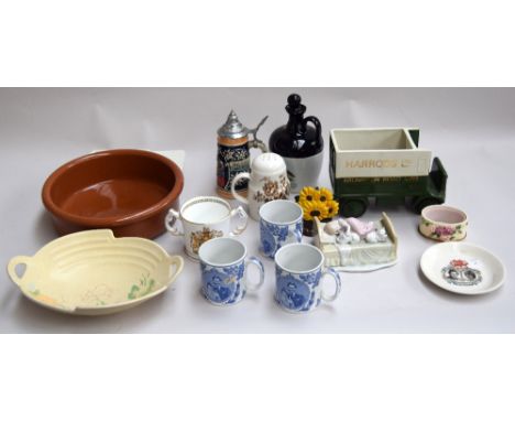 A small collection of ceramics, to include green ceramic car model 'Harrods Ltd', German beer stein, four commemorative cups 
