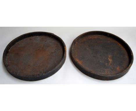 A pair of cast iron planter stands 38cmD