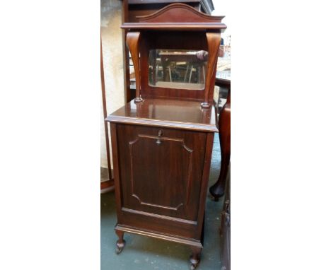 An Edwardian coal scuttle with liner, shelf above with mirrored back