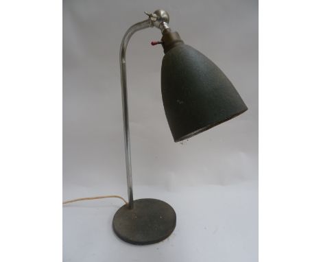 An early anglepoise lamp with black metal shade