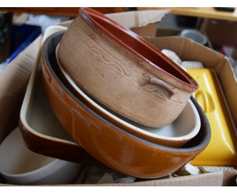 A large selection of ceramic dishes, including casseroles,  rectangular roaster and more other dishes