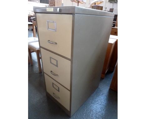 A Ming Hing steel firm company three drawer vintage filing cabinet