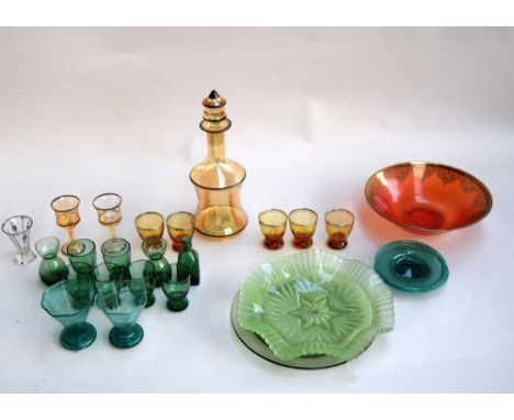 A selection of glass, to include a yellow decanter with matching seven shot glasses, together with two green plates, a red bo