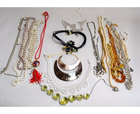 A collection of costume jewellery necklaces, mostly faux pearl necklaces, together with vintage 'Attwod Sawyer' necklace and 