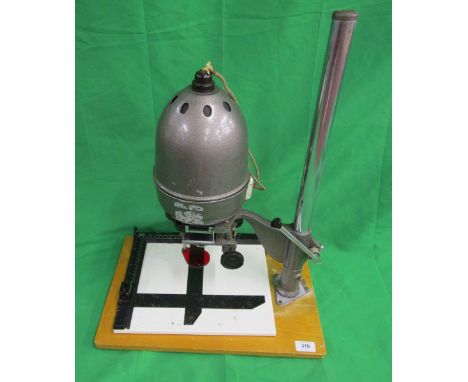 Photography processing kit to include enlarger, film developing tanks and print drying bed 