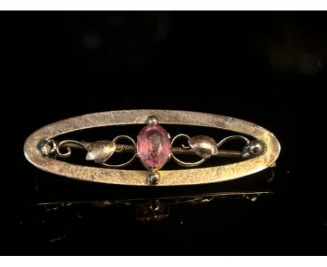 9ct Rose gold pin brooch set with ruby Weight 2.1g