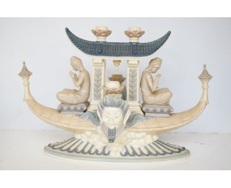 Large Lladro centre piece modelled as a Balinese ceremonial boat Length 45 cm Height 30 cm 