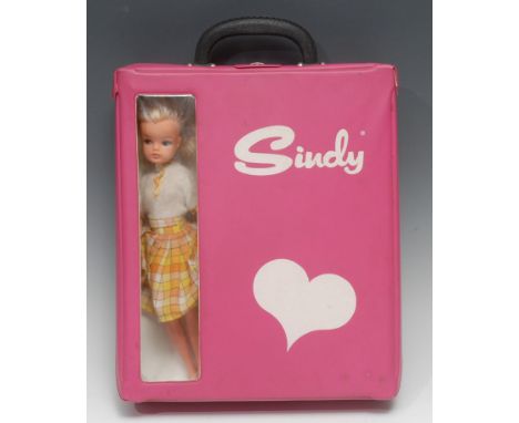 A vintage 1970's rectangular shaped pink vinyl Sindy carry case with single clothes hanger; a late 1970's Pedigree '2nd Gen' 