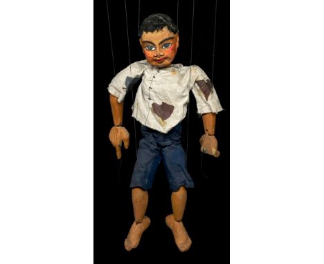 Puppetry – a mid-20th century marionette puppet, in the form of an Asian boy, carved and painted wooden head with detailed pa