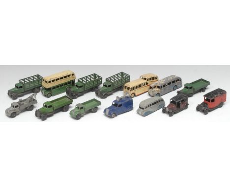 A collection of playworn post war Dinky Toys, including some public transport models, comprising 29b Streamlined bus, light g