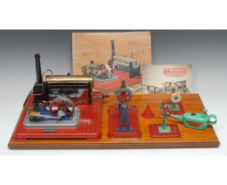 A Mamod SP5 live steam stationary engine with burner, featuring twin cylinders with reverse control, single whistle and exhau