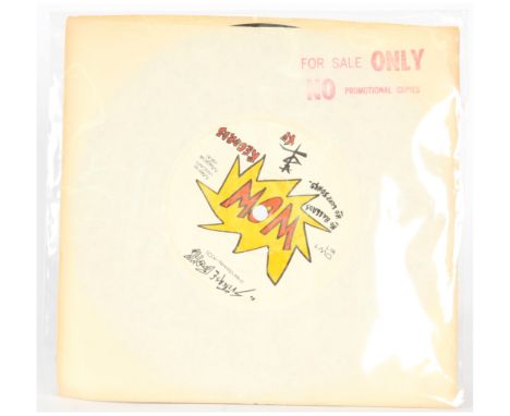 A copy of, K.O - Suitcase Bomb 7" Single (RARE US Press Punk Single, Unknown date of release, WOW Records - WOW 1, Matrix Sta