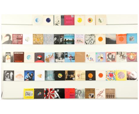 A collection of Country/Folk/World Music 7" Singles to include artists; Bob Dylan, Johnny Cash, Jake Bugg, Christian Kjellvan