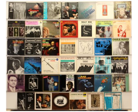 A group of jazz/blues LPs to include artists such as Jim Robinson, Pee Wee Russell, Django Reinhardt, Charlie Parker, Jack Te