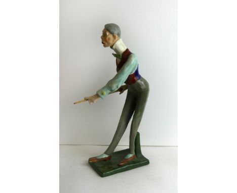 A Royal Amphora ceramic figureModelled in the form of a standing snooker player, raised on green plinth base, height 40cm