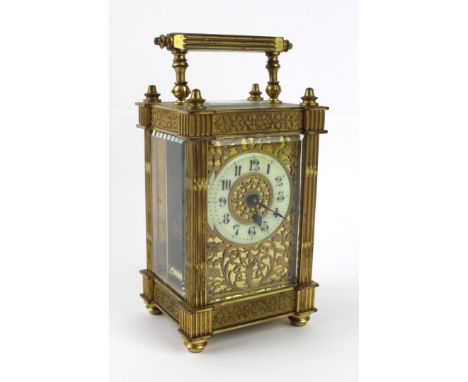 A French carriage clock, late 19th/early 20th Century in architectural brass caseWhite enamel chapter ring surrounded by pier