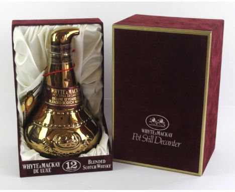 1 rare litre Bottle Whyte & Mackay 12 yo Deluxe WhiskyIn gold ceramic 'Pot Still' decanter with necklet and in original plush