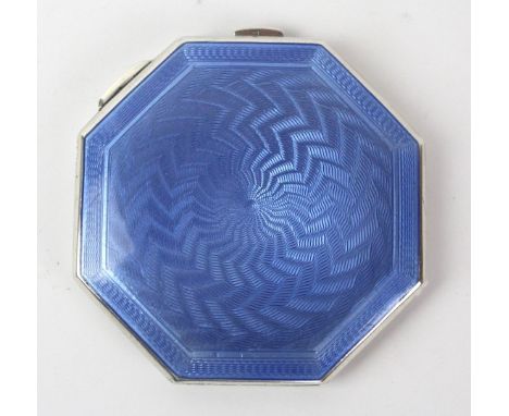 A George V hallmarked silver and guilloche enamel powder compact
Of octagonal form, made by John William Barrett, Birmingham 