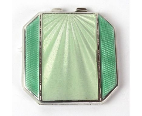 A George VI hallmarked silver and guilloche enamel compact
Having two tone green colourway with central sunray decoration, ma