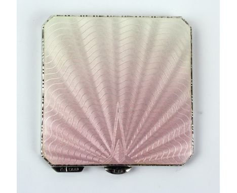 A George V hallmarked silver and guilloche enamel powder compact
Of square form, having sunburst design on a two tone enamell