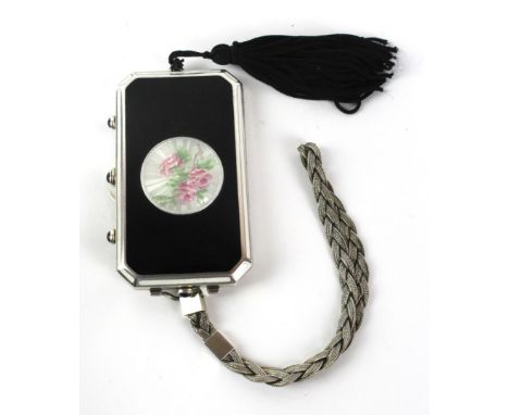 A fine quality Foster & Bailey sterling silver and black enamel powder compact
Of shaped rectangular form, with central circu