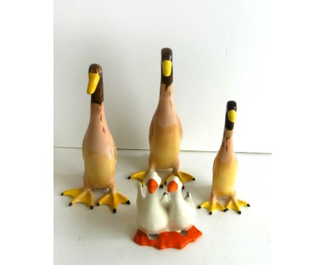 Three Beswick models of Indian Runner Ducks
Height of two largest examples 16cm, smaller example 12cm, together with a Beswic