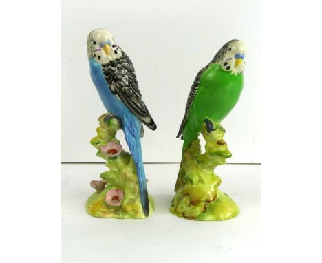 Two Beswick Budgie's 
To include blue 1216 and green 1217, each with impressed factory marks CONDITION REPORT: Very minimal c