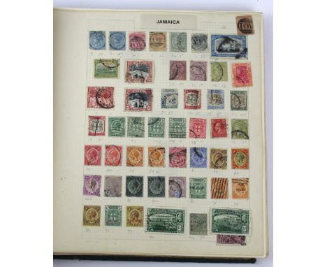 A green stamp album containing mint and used Commonwealth stamps Including some over printed examples with many examples from