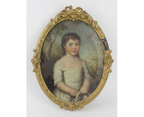 19th Century British School - an oval portrait of a young girl in a parkland landscapeOil on canvas, 29x24cm, inset into a na