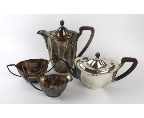 A 1930s silver tea setComprising a teapot, hot water jug, milk jug and sugar pot with tapering sides and angular handles, Bar