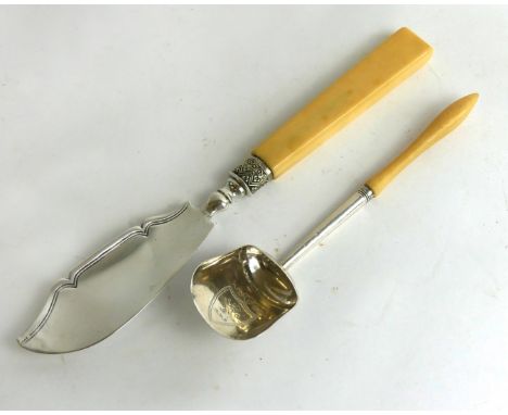 A Georgian silver caddy spoon and butter knifeEach designed as a plain bowl and blade with engraved decoration and ivory hand