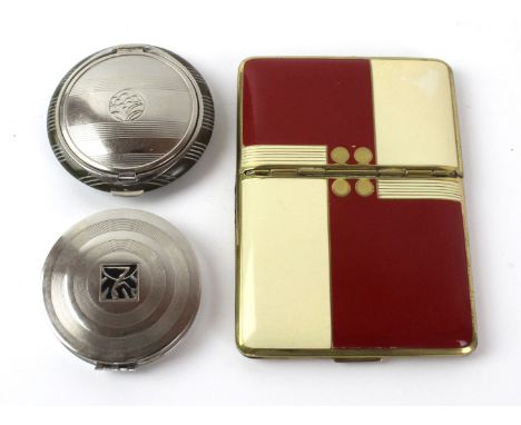 A Richard Hudnut Art Deco vanity/cigarette case
Of rectangular form, having red and cream enamelled decoration, length 11cm, 