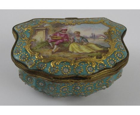 A French Sevres porcelain hand painted trinket box and coverOf scalloped form, the cover decoration with a male figure playin