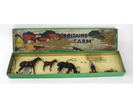 A Britains farm, no. 148F setContaining horses, foal, sheep dog, man and trough 