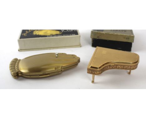 Two vintage powder compacts
To include Pygmalion Sonata compact number 21, fitted in original box, together with a 'Golden Ge