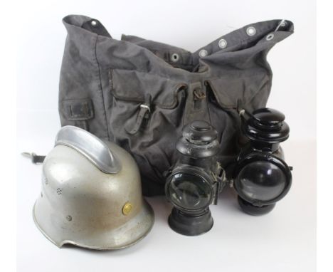 A German Fireman's Helmet, mid 20th CenturyGrey painted helmet with high comb, leather lining, collection of German military 