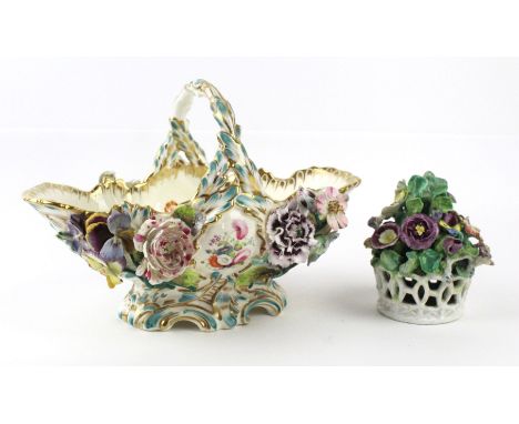 A 19th Century hard paste porcelain basket
Having floral encrusted decoration with hand painted floral designs, height 16cm, 