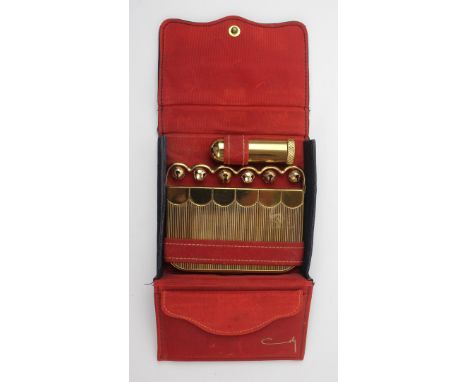 A Coty of New York 'Sleigh Bells' vanity Goldstone compact
Of rectangular form with articulated bar and six bells, complete w